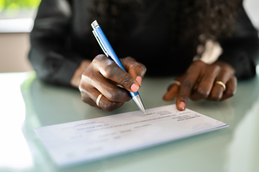 Female writing a check